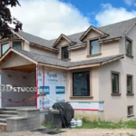 Finished stucco exterior with architectural details in Innisfil, Ontario